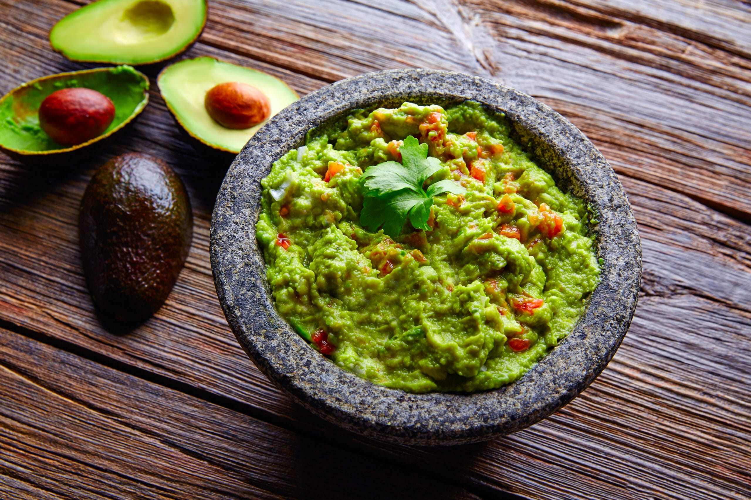 avocado Guacamole on molcajete real Mexican