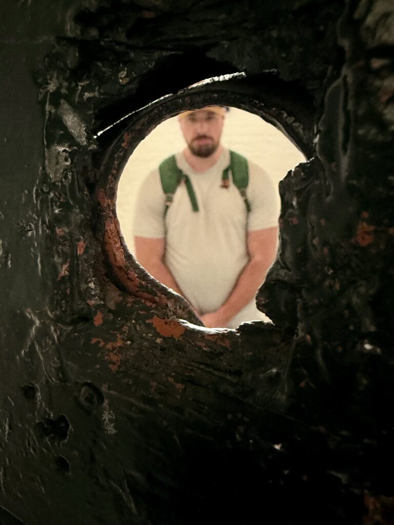 Through the peep hole of a cell door