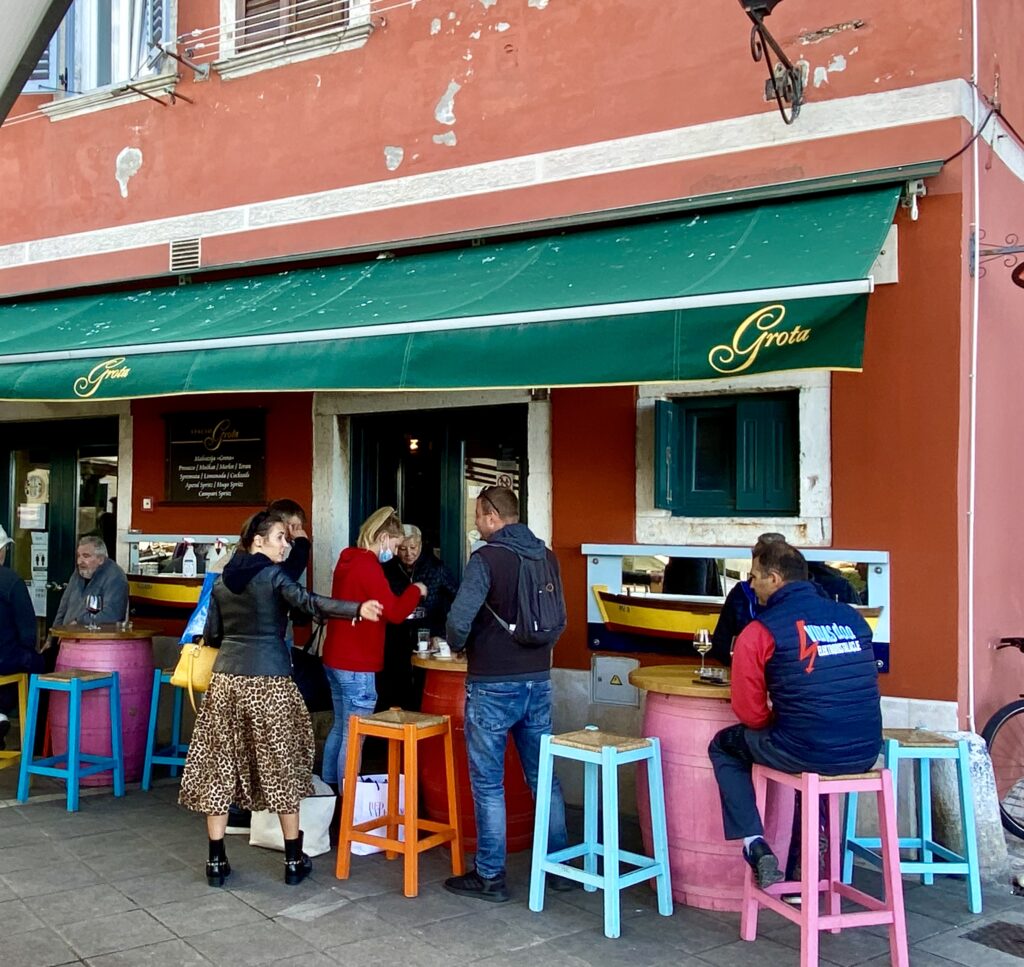 Locals gather at Rovinj cafe/bar