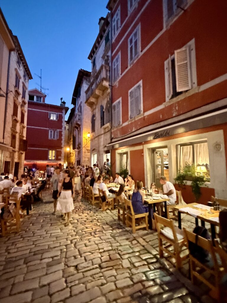 Rovinj street dining at night
