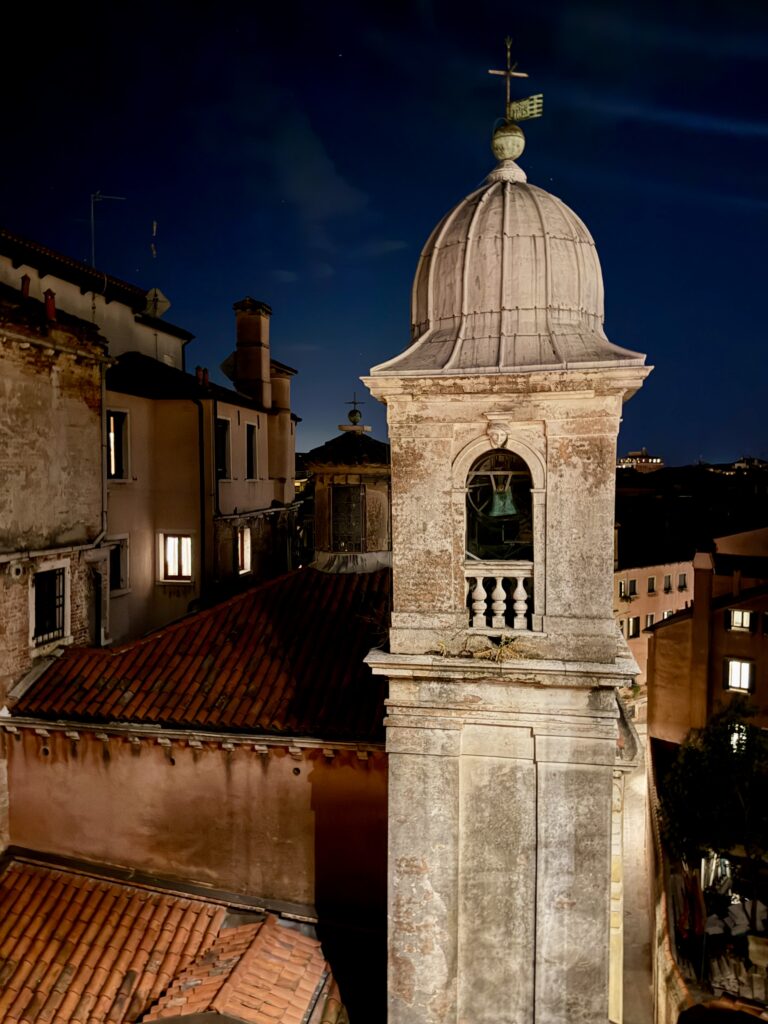 Bell tower at night in Venice