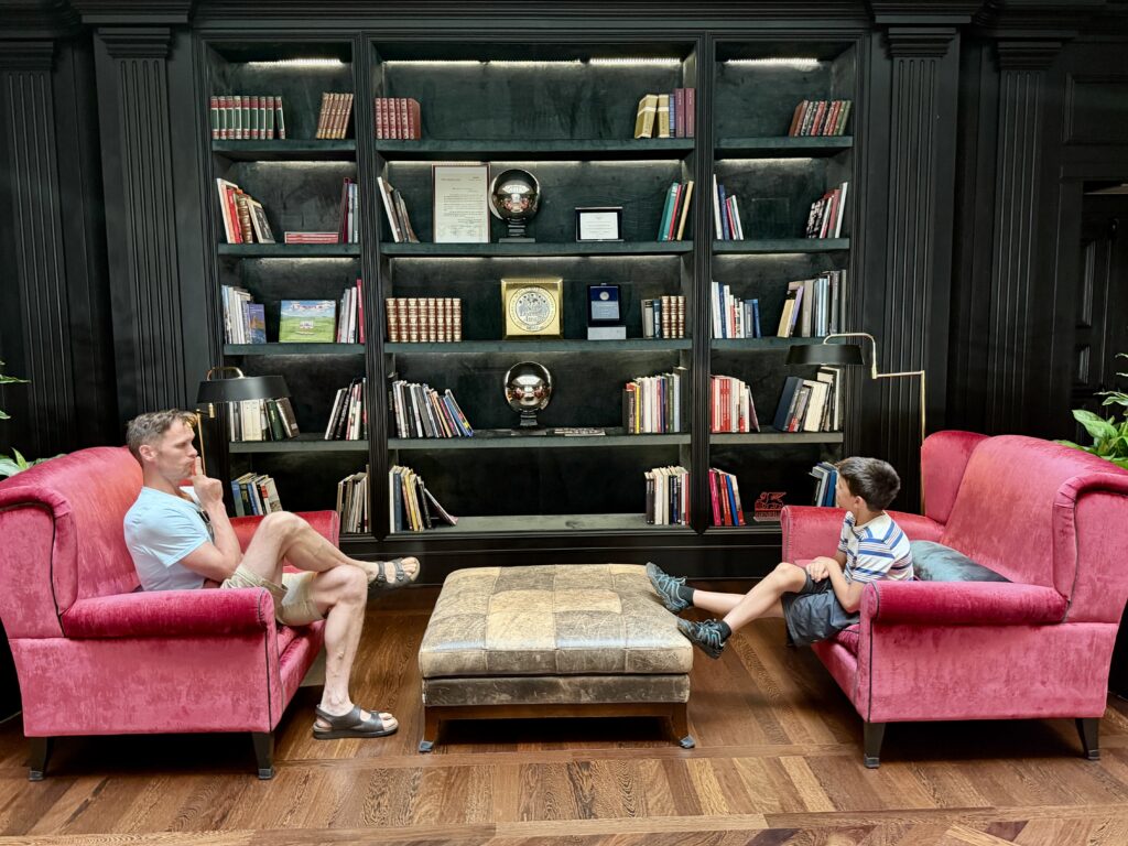 Ryan and his son at the Savoia Excelsior Palace Trieste, Italy Photo by Wanderers Compass